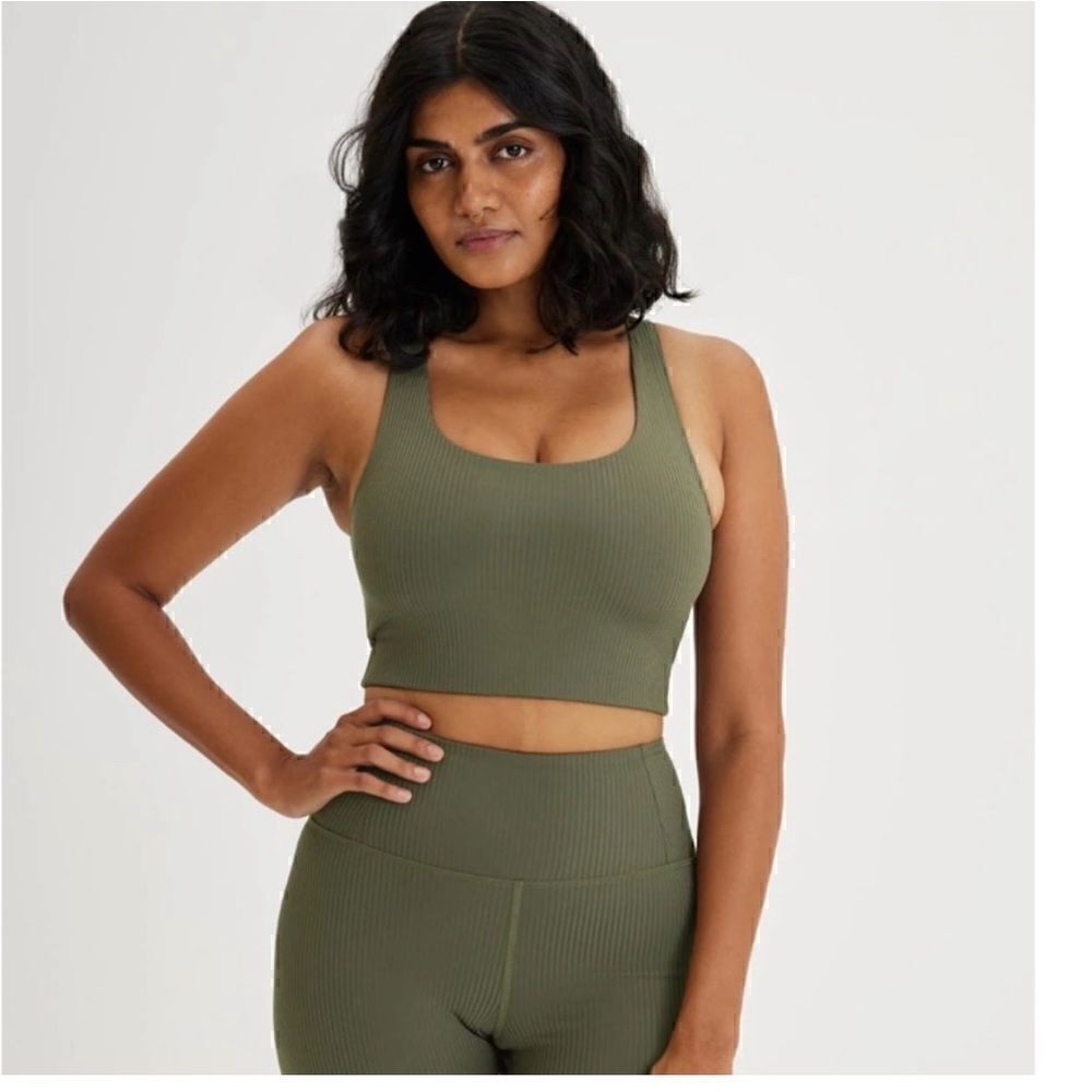SET of Girlfriend collective ribbed leggings and Paloma bra cypress green